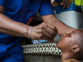 Child Receiving the Polio vaccine