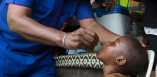 Child Receiving the Polio vaccine