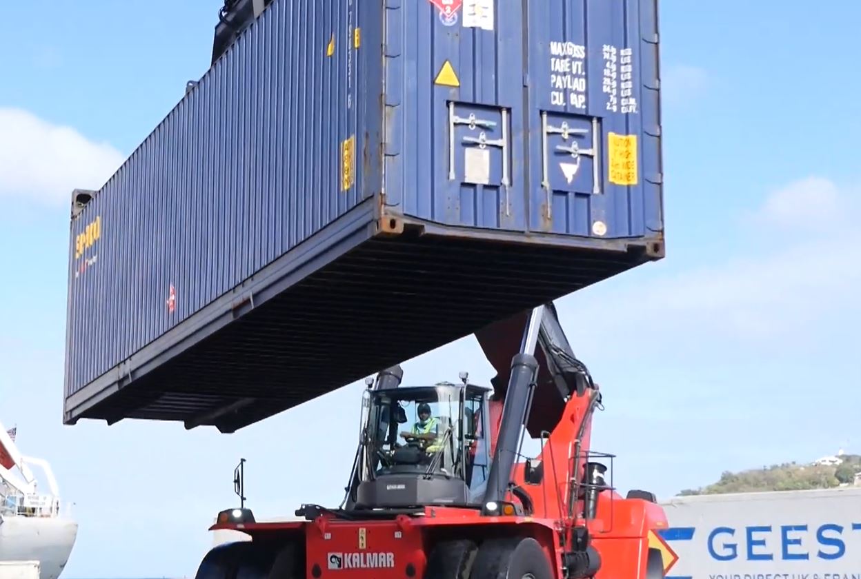 SLASPA forklift carrying container.