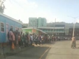 Stranded commuters at Gros Islet bus stand in Castries.