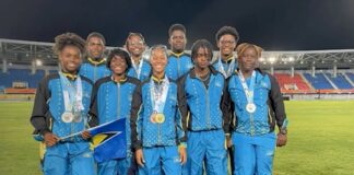Saint Lucia's CARIFTA games team pose with their medals.
