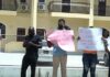 Guyana activists stage demonstration to demand release of a teenager charged with starting a deadly fire that killed 20 students.