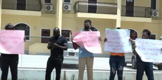 Guyana activists stage demonstration to demand release of a teenager charged with starting a deadly fire that killed 20 students.