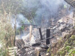 Aftermath of wooden dwelling house fire at Ti Rocher, Castries.