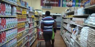 Couple shopping in supermarket.