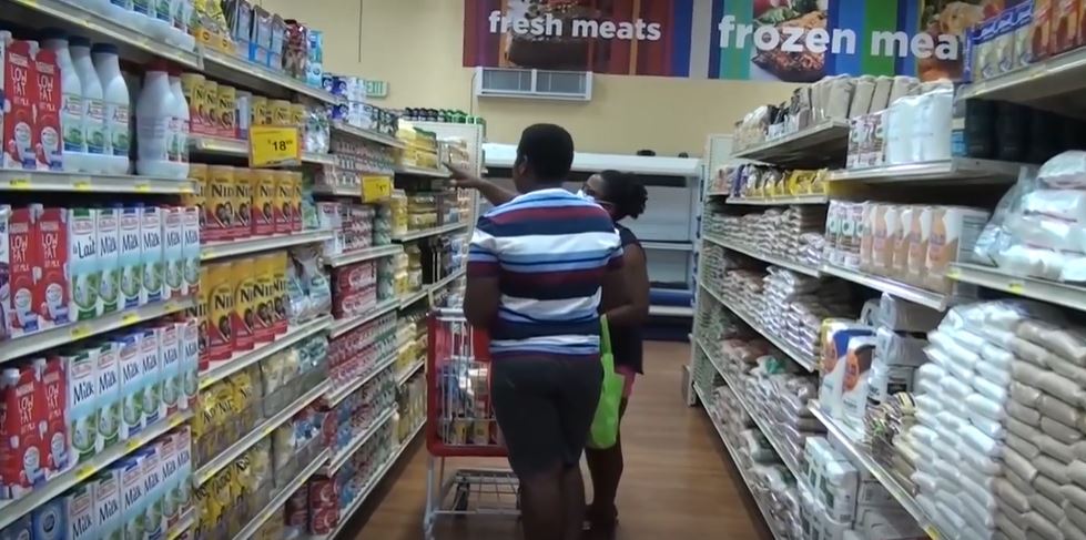 Couple shopping in supermarket.