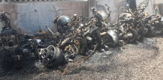 Motorbikes destroyed by fire in Marigot police station parking lot.