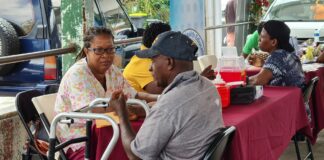 Gros Islet fishers get health check at health fair.