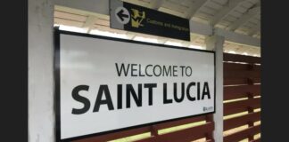 'Welcome to Saint Lucia' sign at airport.