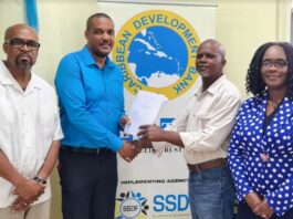 Cheque handover to facilitate early childhood development in Saint Lucia.