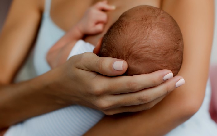 Mother breastfeeding baby