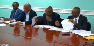 Saint Lucia Prime Minister and other officials sign agreement for redeveloping Castries Port and Soufriere Waterfront.