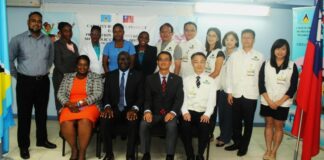 Saint Lucians selected for medical training in Taiwan pose with Health Minister, Taiwanese Ambassador and other officials.