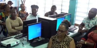 Vendors receive computer literacy training.