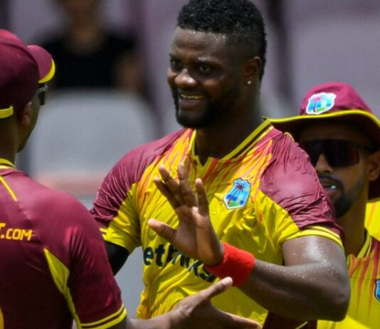 West Indies cricketers celebrate win over India.