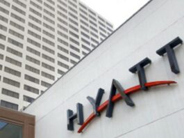 Hyatt hotel sign on building.