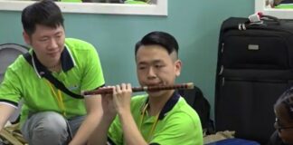 Taiwan youth ambassadors play musical instruments.