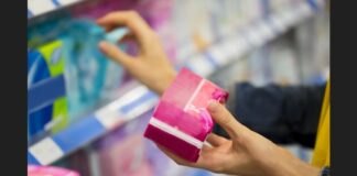 Woman shopping for female sanitary products