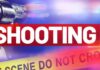 Two men killed in separate shootings in Castries Graphic artwork of a revolver against a blue background and red lettering saying 'shooting' above a yellow police crime scene tape.