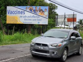 Billboard promoting vaccines.