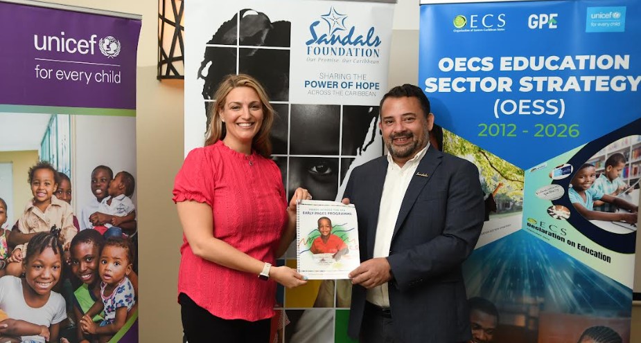[L-R] –Amanda Sherlip, Executive Director Hands Across the Sea shares moment with Carl Beviere Regional Managing Director, Sandals Resorts International ( Barbados and Antigua)