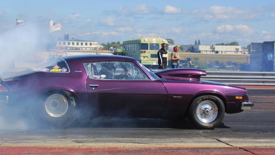 Vehicle takes part in drag racing.
