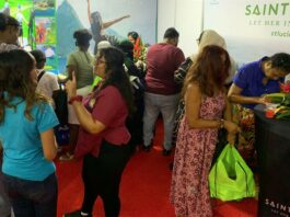 People at Saint Lucia booth during GuyExpo 2023.