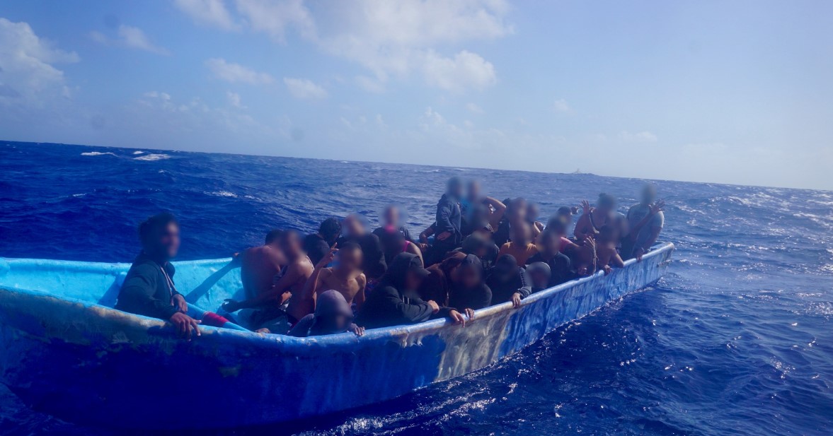 Illegal Caribbean migrants aboard overloaded vessel.