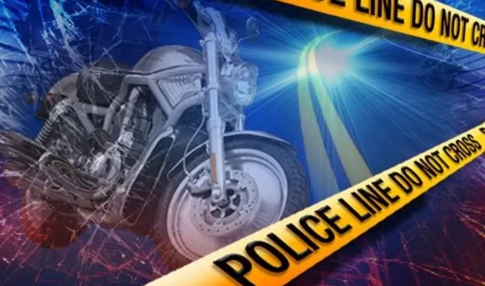 Graphic art portraying highway, a motorcycle and yellow police caution tape.
