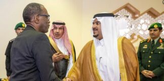Saudi officials greet Saint Lucia's Prime Minister Philip J. Pierre on his arrival in Riyahd for the Saudi-CARICOM summit.