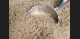 Rice with metal scoop.