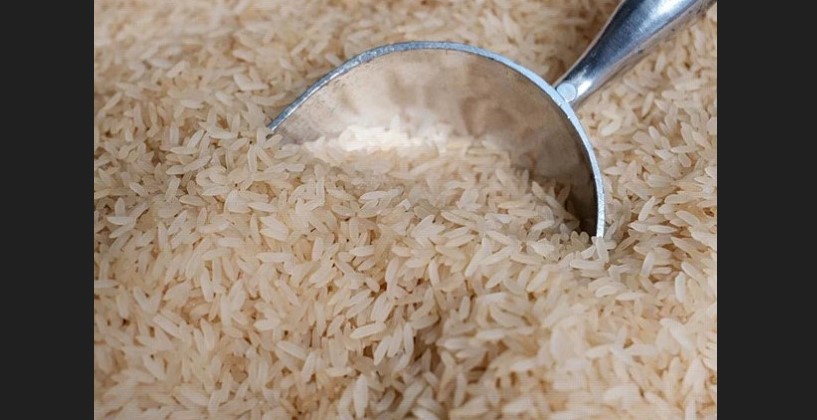 Rice with metal scoop.
