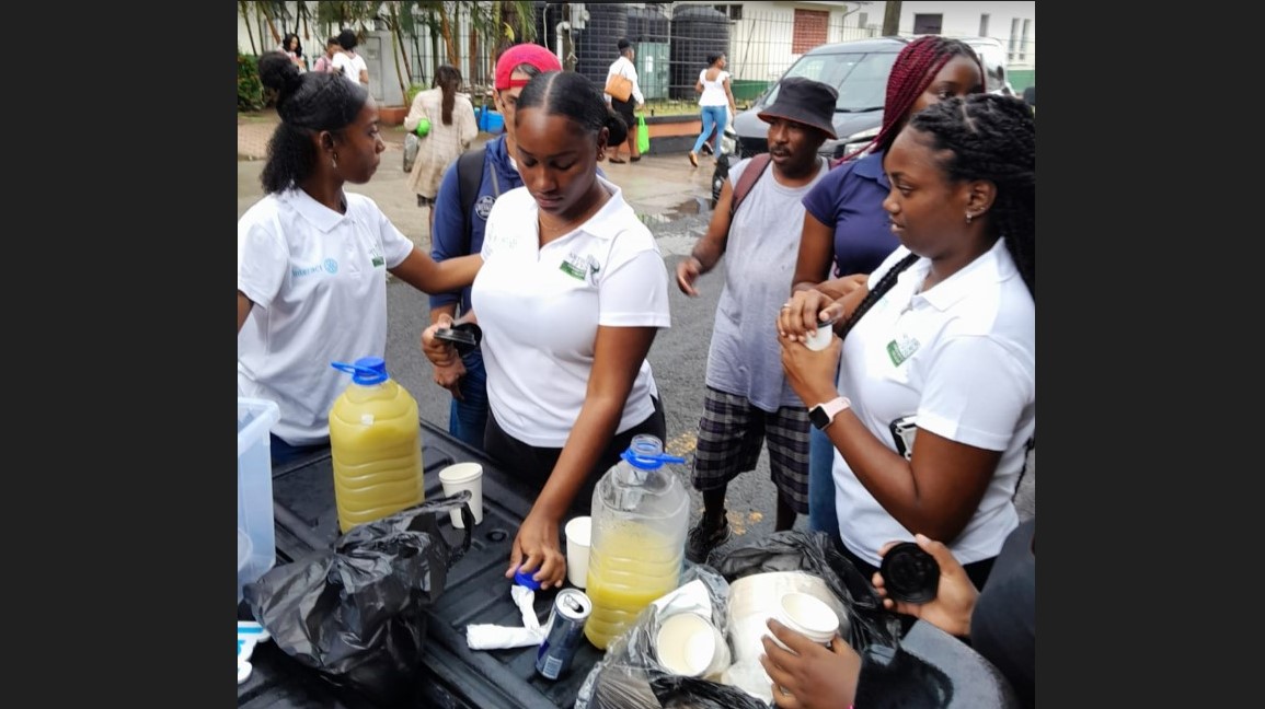 Sir Arthur Lewis Community College students feed the poor in Castries.