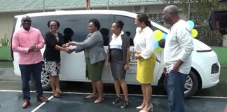 Officials at handover ceremony for vehicle donation to Soufriere Hospital.