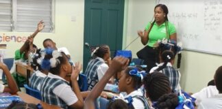 Students learn about Saint Lucia renewable energy project.