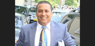 A beaming Guy Joseph outside parliament in this dated photo.