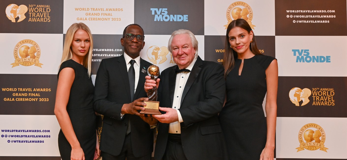 Philip J. Pierre accepts Saint Lucia's award of Best Honeymoon destination.