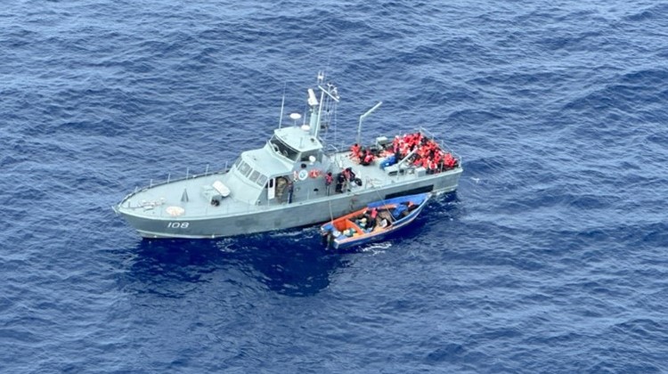 United States Coast Guard rescues 33 illegal Caribbean migrants from makeshift vessel at sea.
