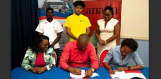 Signing of agreement for Canadian funding of project to benefit vulnerable Saint Lucian boys.