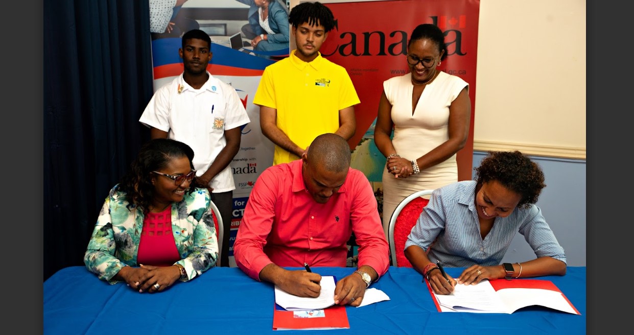 Signing of agreement for Canadian funding of project to benefit vulnerable Saint Lucian boys.