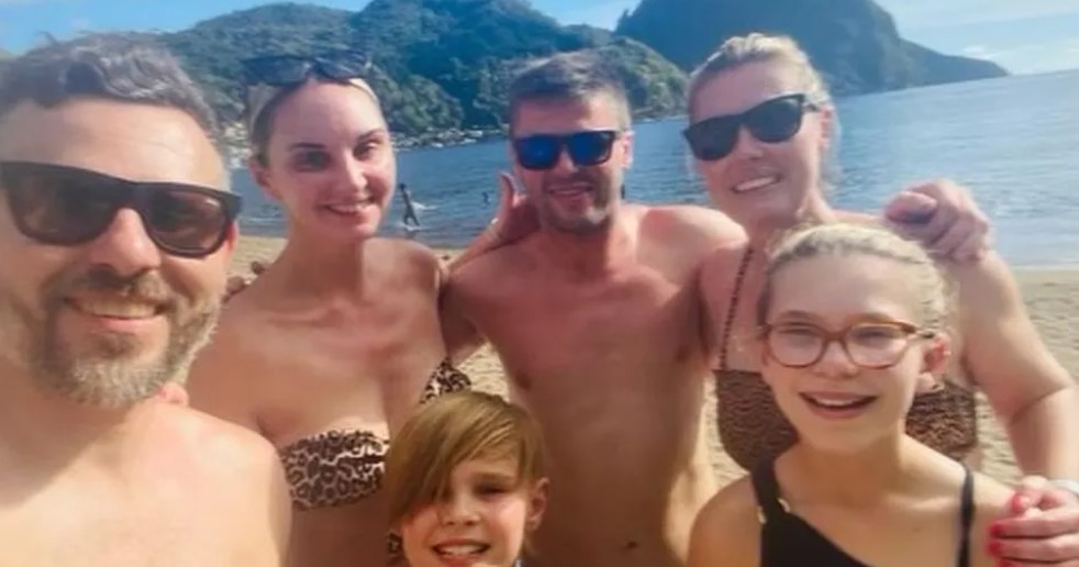Matt Hammond and family on the beach.