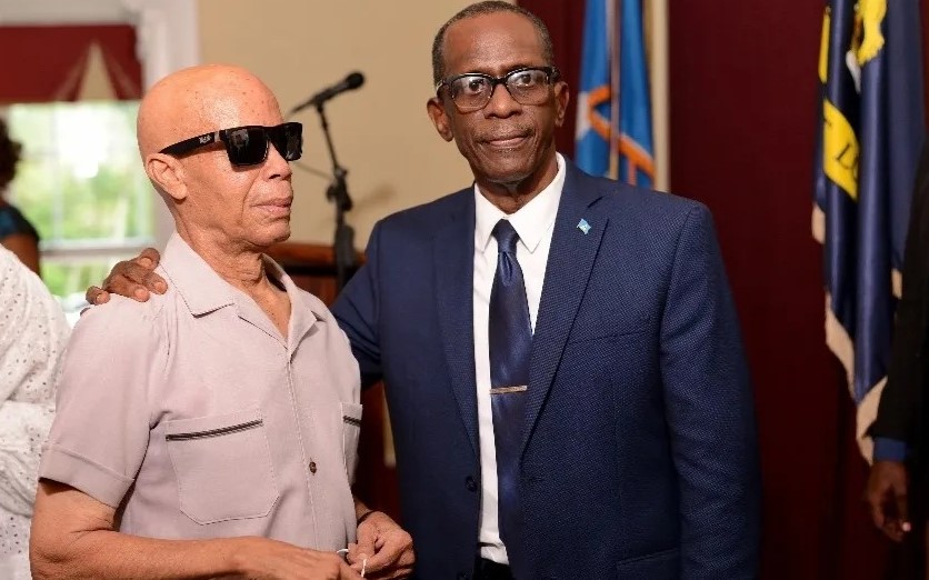 The late Tom Walcott and Prime Minister Philip J. Pierre (left to Right)