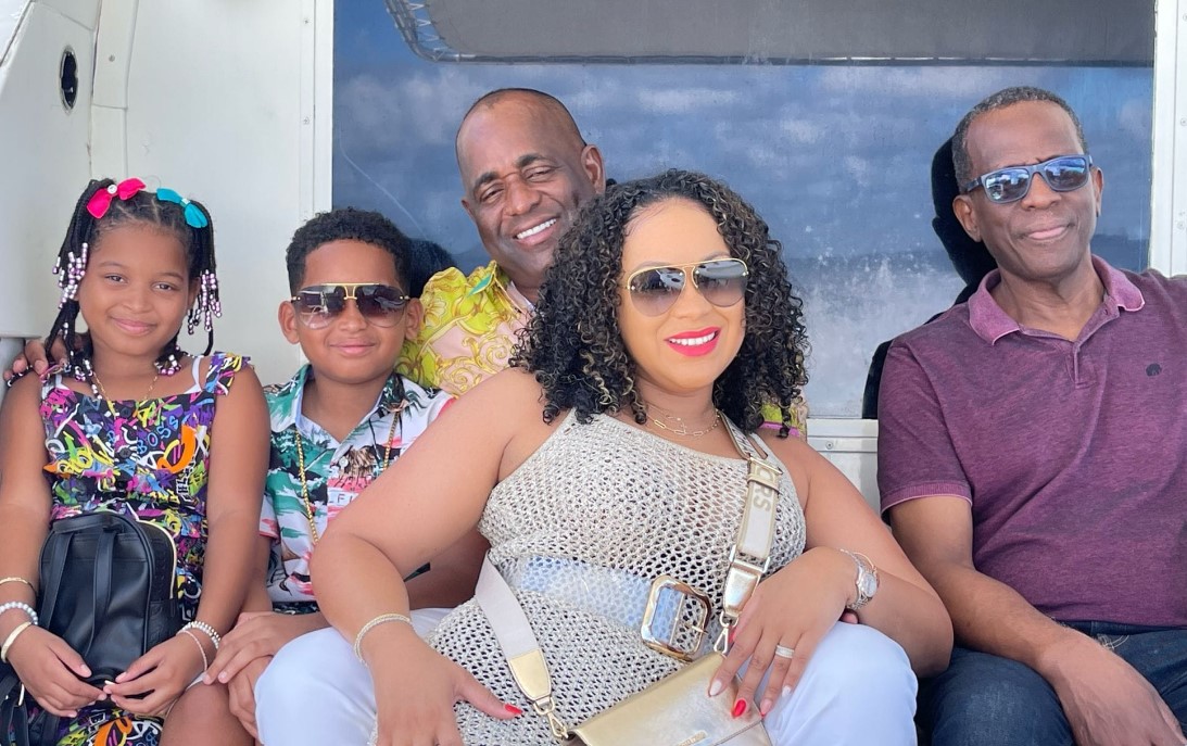 Dominica Prime Minister Roosevelt Skerrit and family on vacation in Saint Lucia pose for a photo with Saint Lucia's Prime Minister Philip J. Pierre.