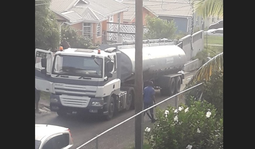 WASCO truck takes water to residents of Daren Sammy Drive, Gros Islet.