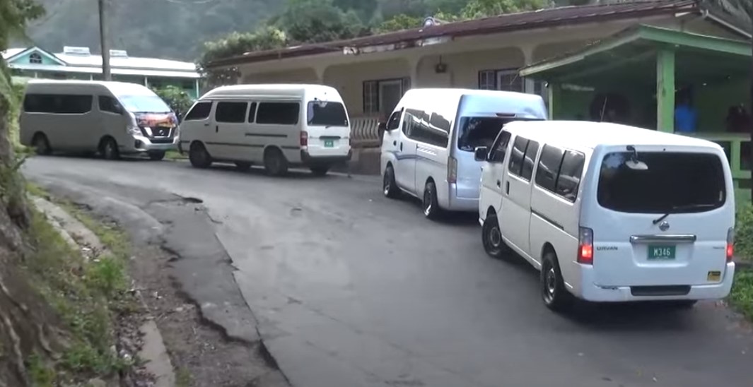 Parked buses as drivers participate in protest over poor road conditions in Soufriere-Fond St. Jacques.