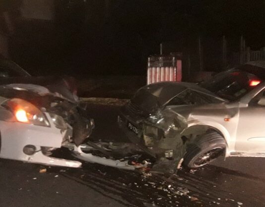 Mangled metal of two vehicles after head-on collision at Goodlands, Castries.