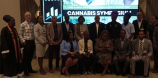 Cannabis symposium participants pose for photo.