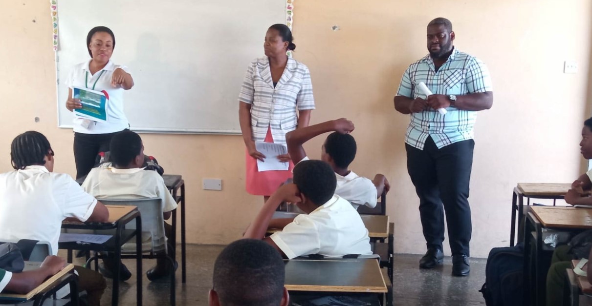 Police interact with students in classroom at the Ciceron Secondary School.