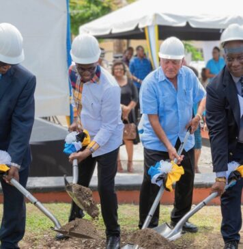 Prime Minister Philip J. Pierre and other officials turn the sod to start construction of the Saint Lucia Halls of Justice.