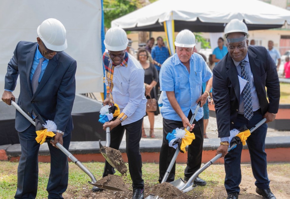 Prime Minister Philip J. Pierre and other officials turn the sod to start construction of the Saint Lucia Halls of Justice.